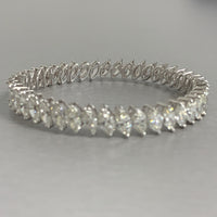 Beauvince Inaya Marquise Solitaire Diamond Bangle in White Gold