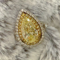 Illumina Ring (8.85 ct Pear Shape Fancy Yellow GIA Diamond) in Platinum