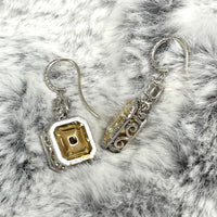 Exuberance Earrings (8.47 ct Radiant Fancy Yellow Internally Flawless GIA Diamonds) in Platinum