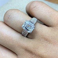 Steps Engagement Ring (3.20 Emerald Cut IVVS2 GIA Diamond) in White Gold