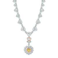 Amore Heart Diamond Earrings (5.61 ct Diamonds ) in White Gold